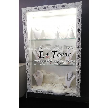 Suspended wall-mounted Baroque style showcase with perforated frame, custom-made bottle holder and TV box
